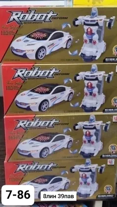 Игрушка, пластик Машина трансформер музыкальный светящийся на батарейках Размер 23,5 10см