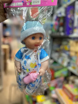 Пупс в пакетиках с соской 25 см . Цена 250